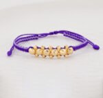 Pulsera De Oro 18k Macramé Con 6 Esfera 6mm Diamantada, Hilo Morado 0,6gr. Largo 19cm